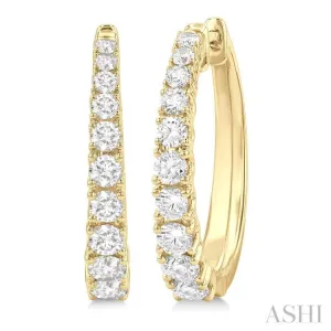 1 1/2 ctw Graduated Round Cut Diamond Fashion Hoop Earrings in 14K Yellow Gold 1 1/2 ctw Graduated Round Cut Diamond Fashion Hoop Earrings in 14K Yellow Gold