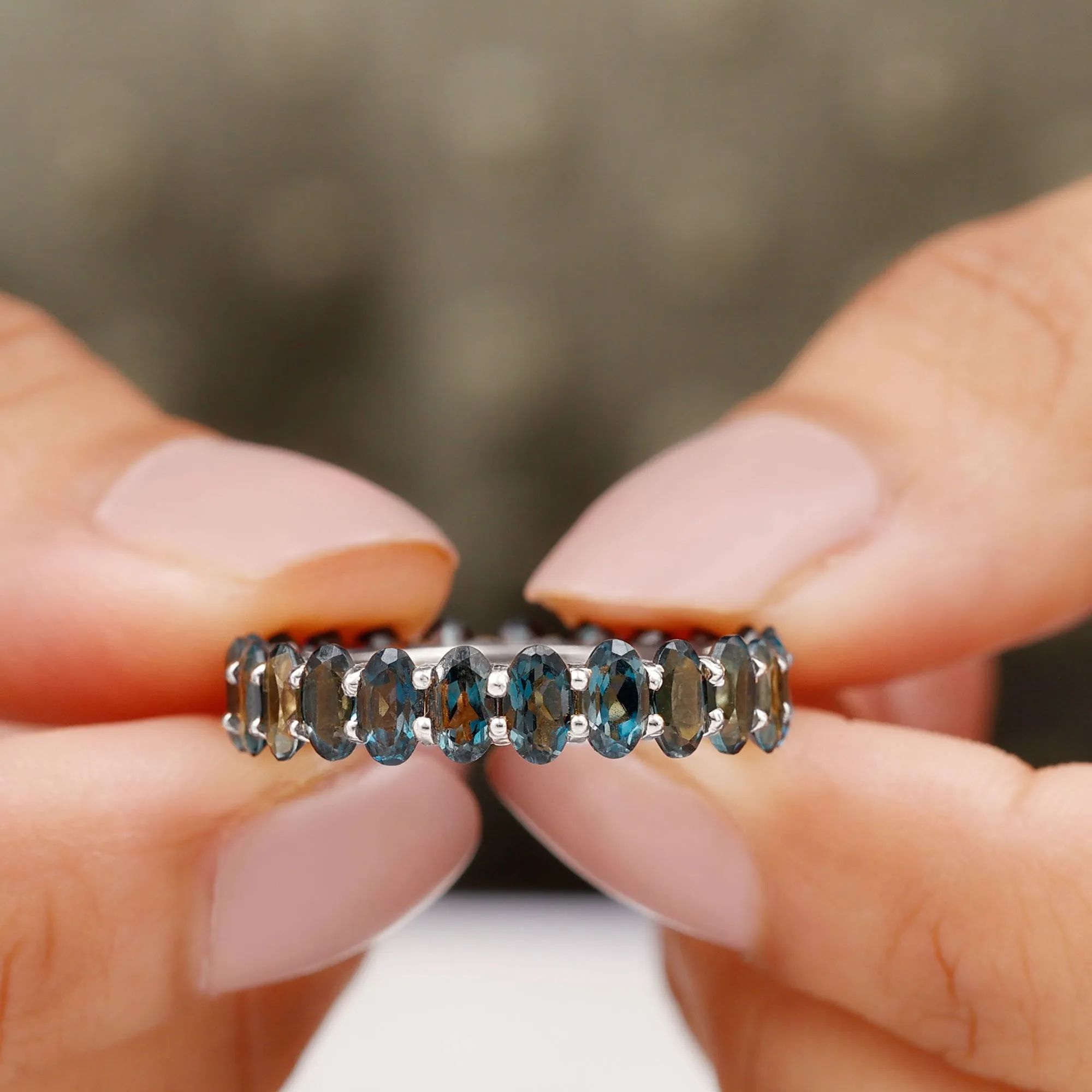 Oval Cut London Blue Topaz Eternity Ring in Shared Prong Setting