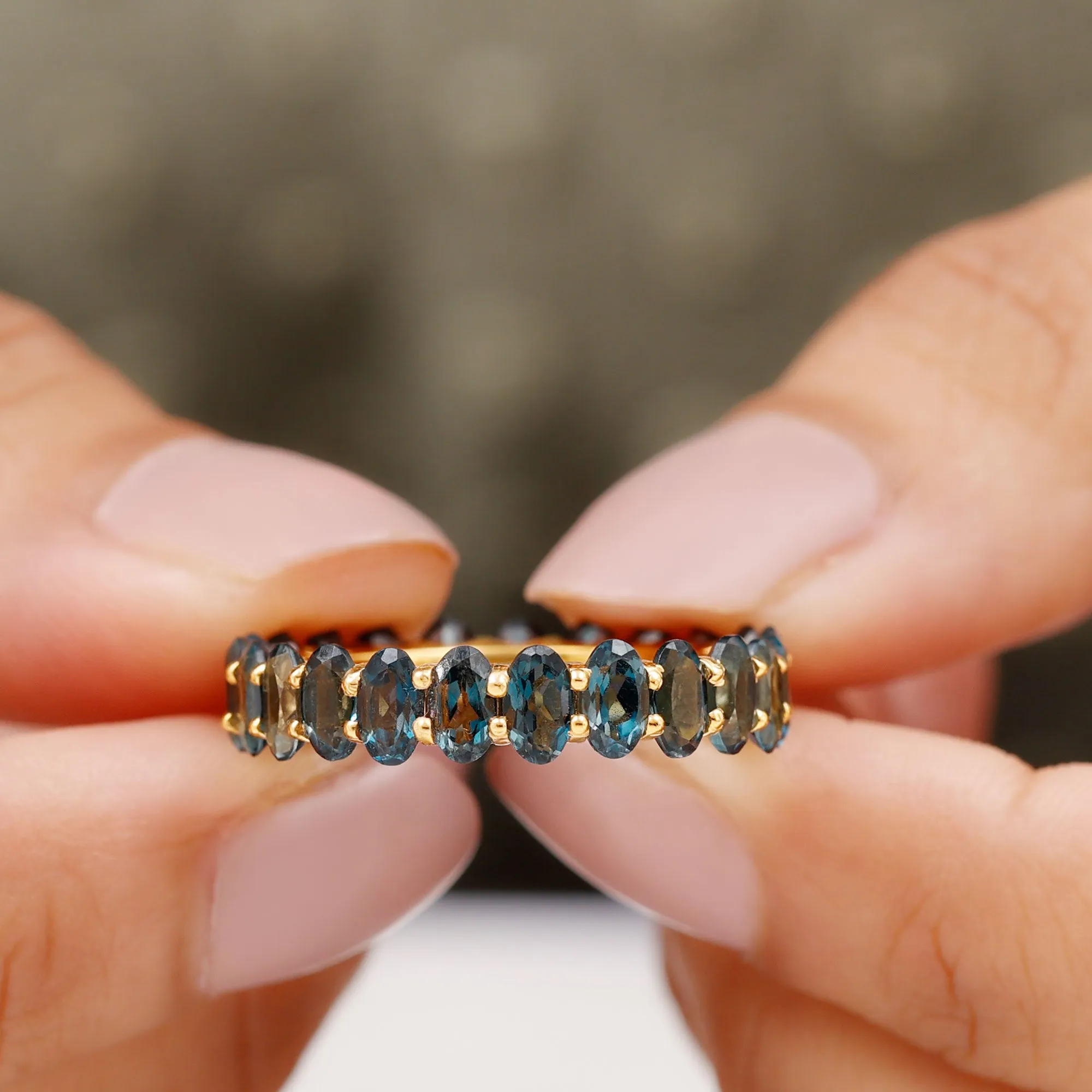 Oval Cut London Blue Topaz Eternity Ring in Shared Prong Setting